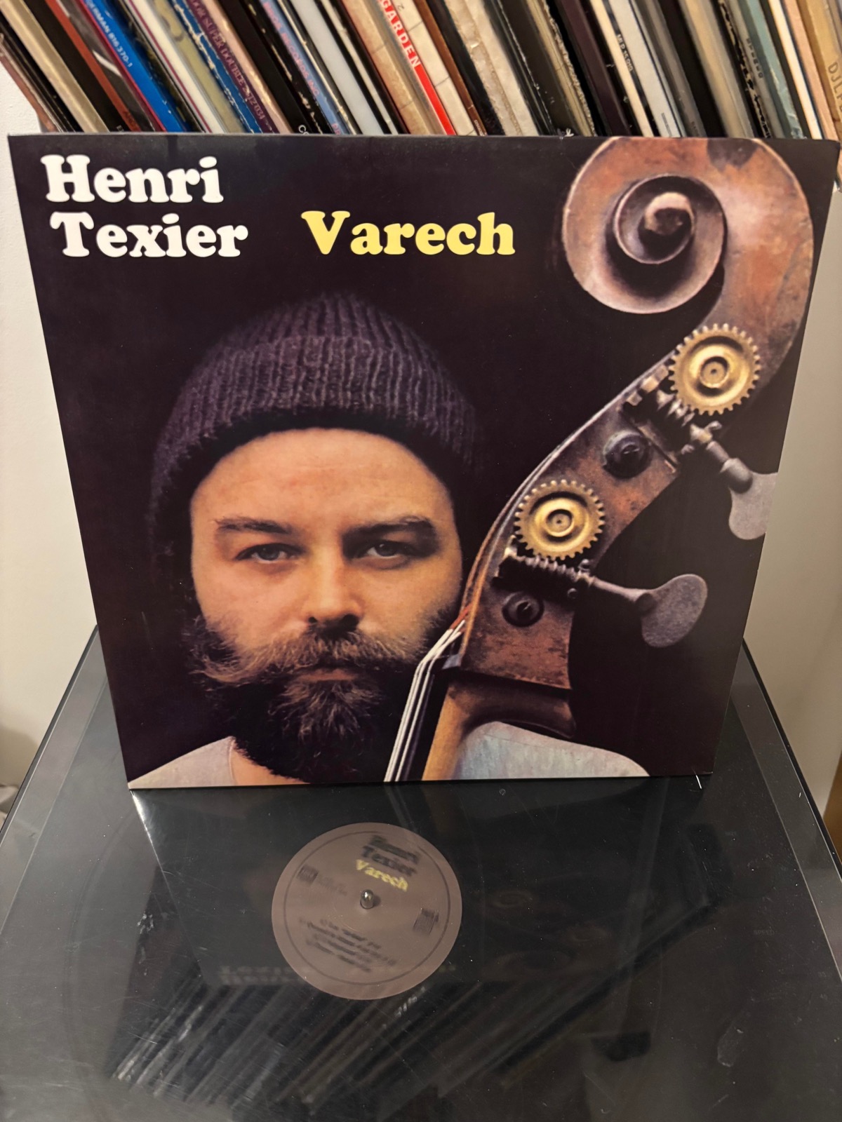 Henri Texier — Varech vinyl album spinning on a turntable; warm lighting on the tonearm and label